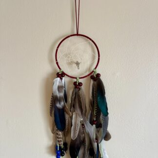 Handcrafted Bull Skull Dream Catcher with Natural Feathers