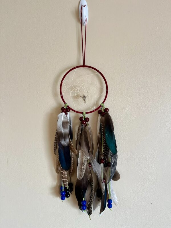 Handcrafted Bull Skull Dream Catcher with Natural Feathers